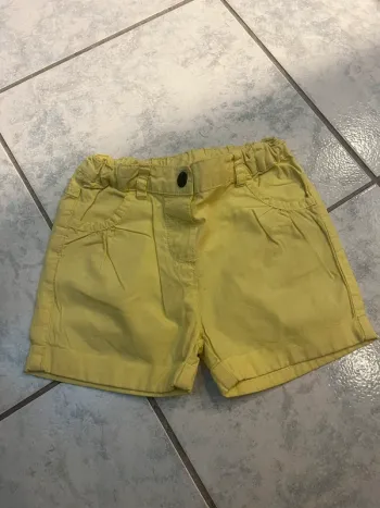 short jaune enfant fille C&A