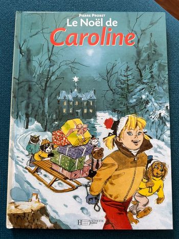 Le Noël de Caroline traîneau cadeaux forêt livre album Hachette Jeunesse Probst
