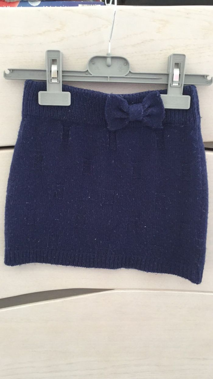 Jupe avec noeud bleu marine 4 ans