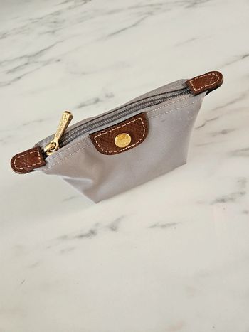 Longchamp. Petit porte monnaie gris