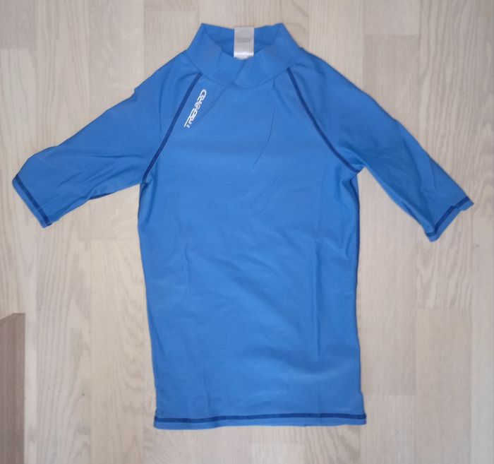 Tee-shirt anti-UV bleu ciel  Tribord 
T. 10 ans