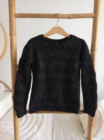 Pull noir brillant 10 ans