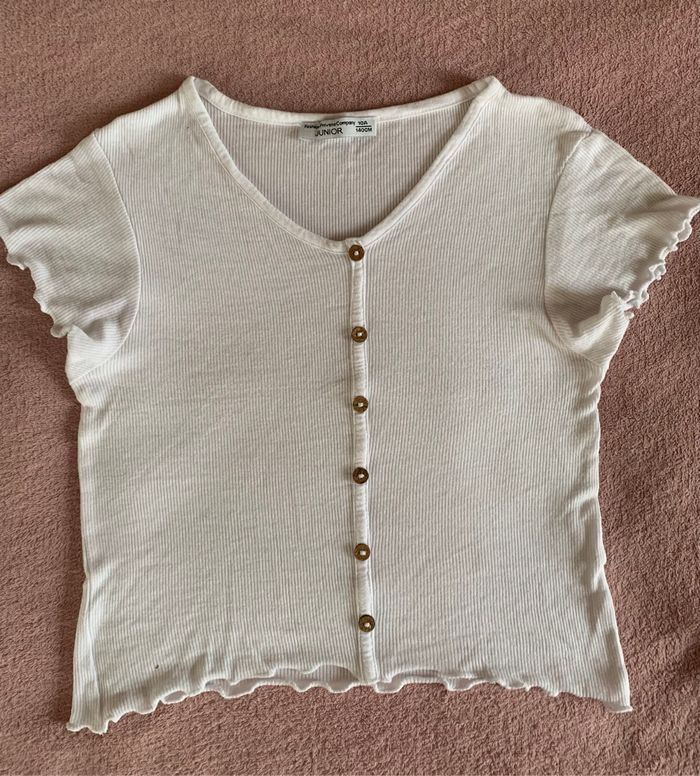 Joli haut blanc bouton bois 10 ans