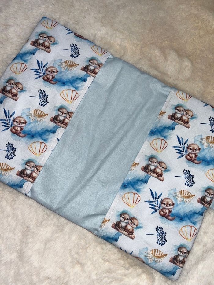 Protège carnet de santé loutre bleu