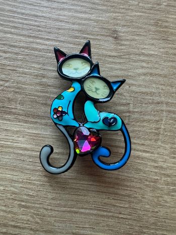 Broche chats bleus