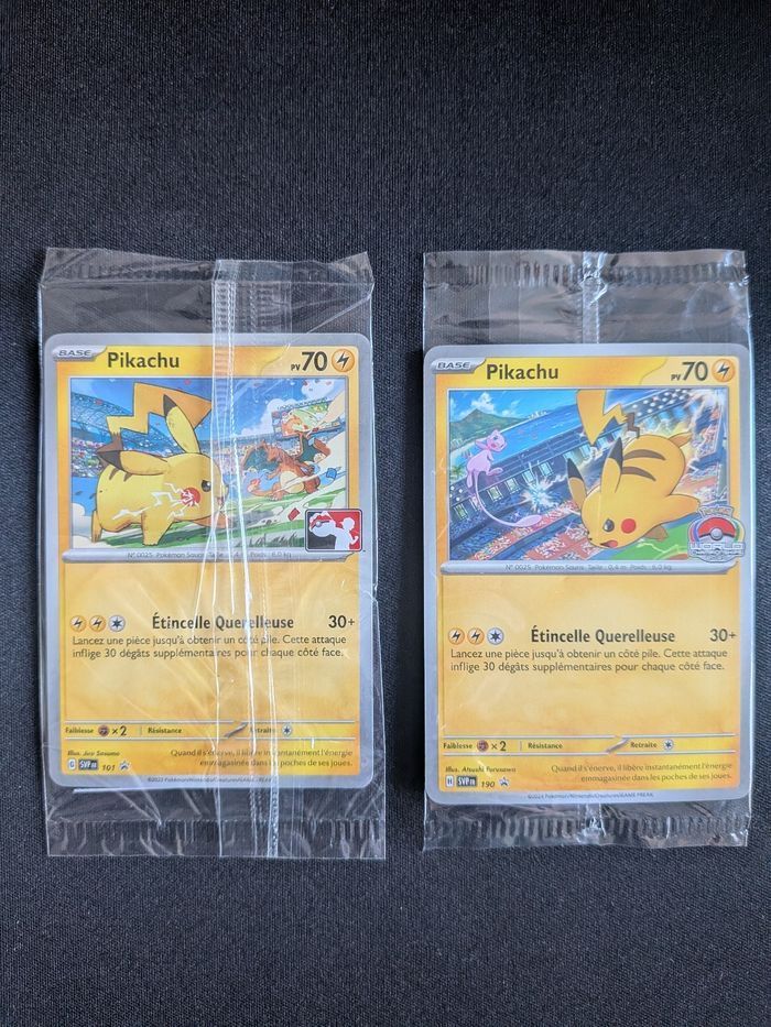Pokémon lots 2 cartes Pikachu Dracaufeu 101 + Pikachu Mew 190 World Championships stamp sous blister