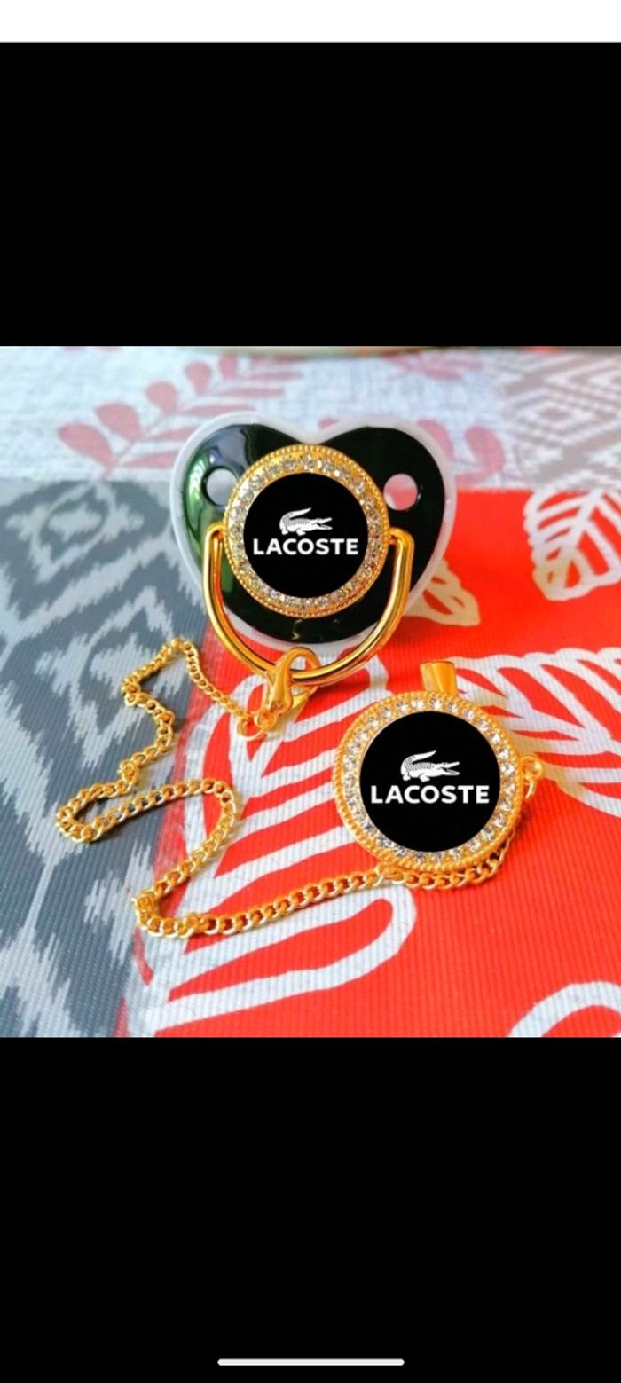 Tétine noir Lacoste