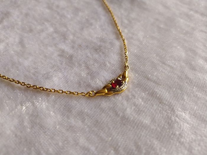 Collier fantaisie doré et rouge