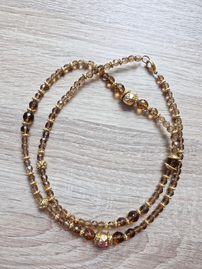 Collier long tons doré et marron