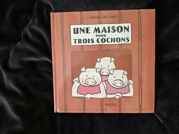 Une maison pour trois cochons 