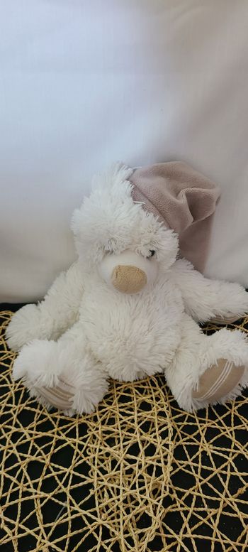 Doudou peluche ours blanc beige bonnet ENESCO