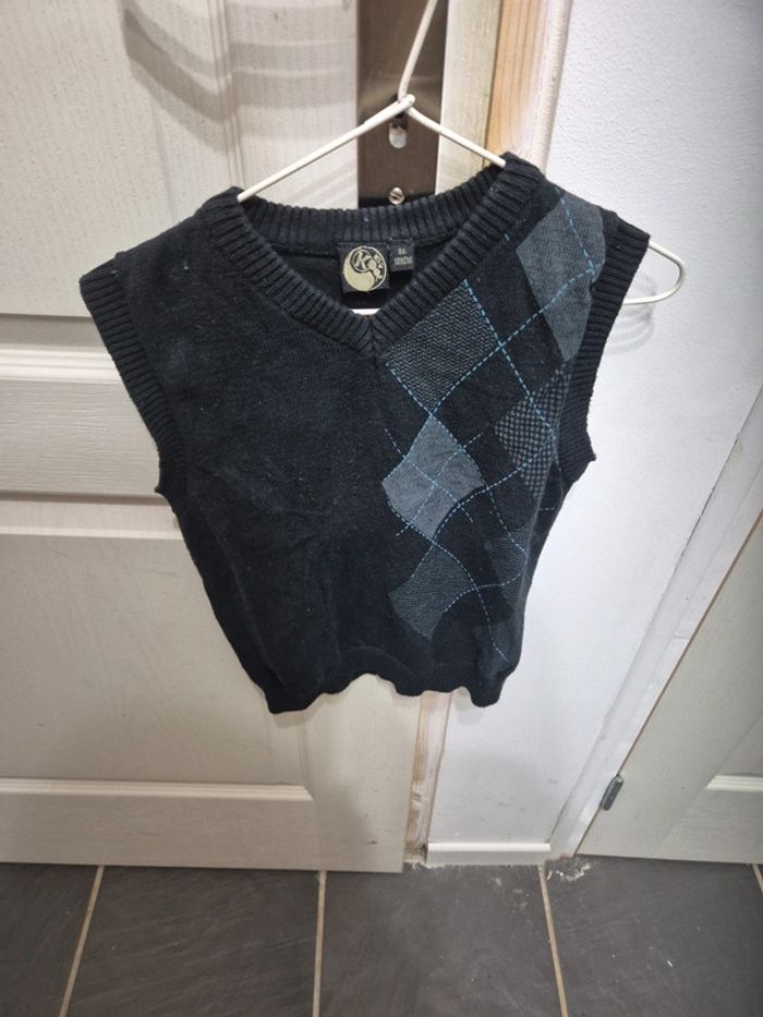 Pull noir sans manche