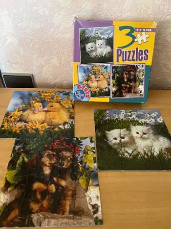 une boite de 3 puzzles 6 - 9 - 16 pièces