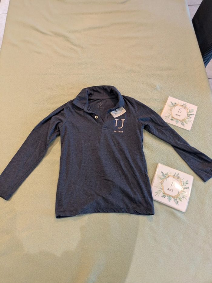 Polo manches longues bleu marine 6-7 ans