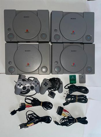 lot consoles PS1 + câbles, manettes, cartes mémoires