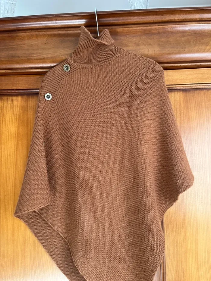 Poncho col montant