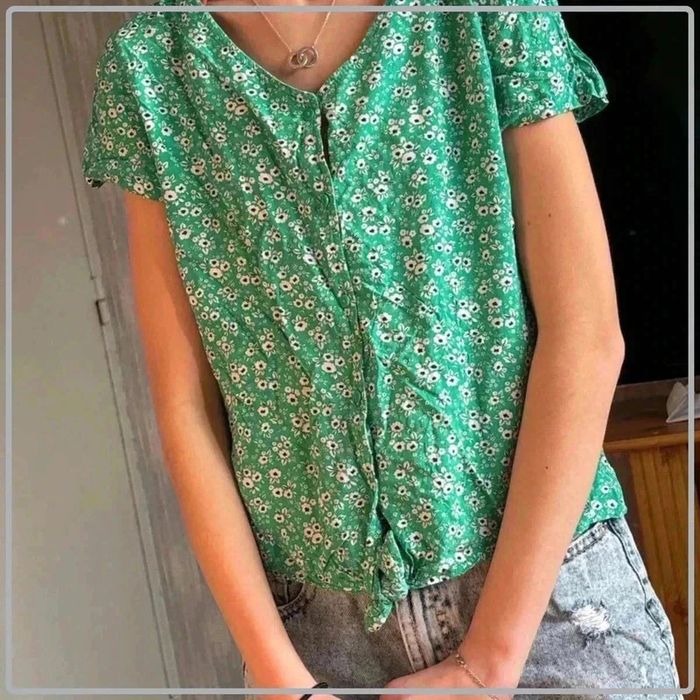 T shirt motif floral taille 34/14ans marque kiabi