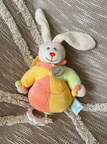 Peluche doudou musical 19cm Baby Nat lapin arlequin jaune orange vert étoile très bon état