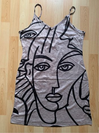 Jolie robe beige et noire taille L