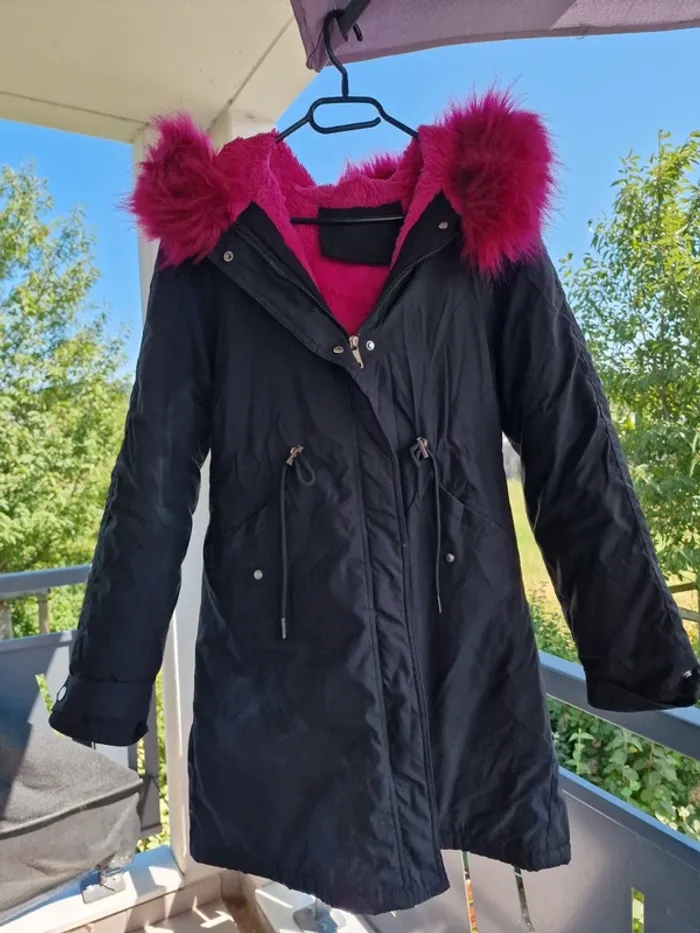 Manteau grosse fourrure fuschia