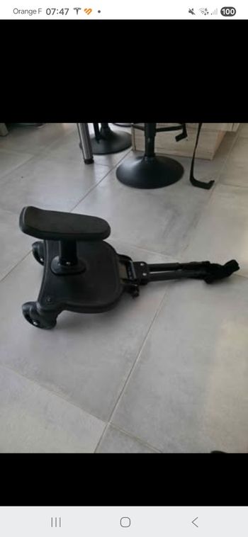 Planche a roulette pour poussette