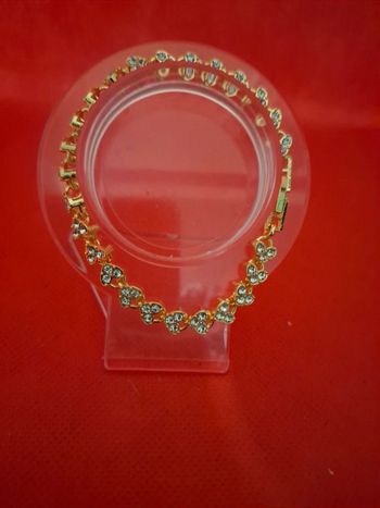 Bracelet acier métal doré neuf avec etiquette et oxydes de zirconium blancs