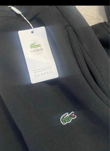 Ensemble lacoste neuve avec etiquette taille XL
