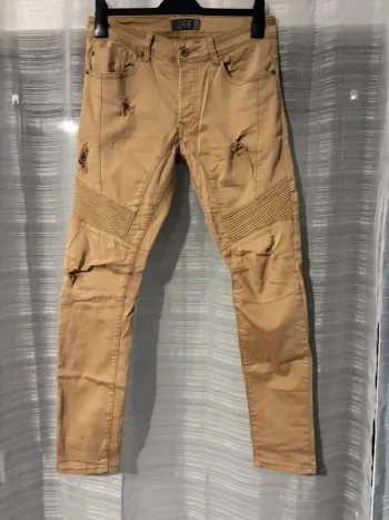 Jeans marron troué
