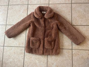 Manteau fausse fourrure H&M