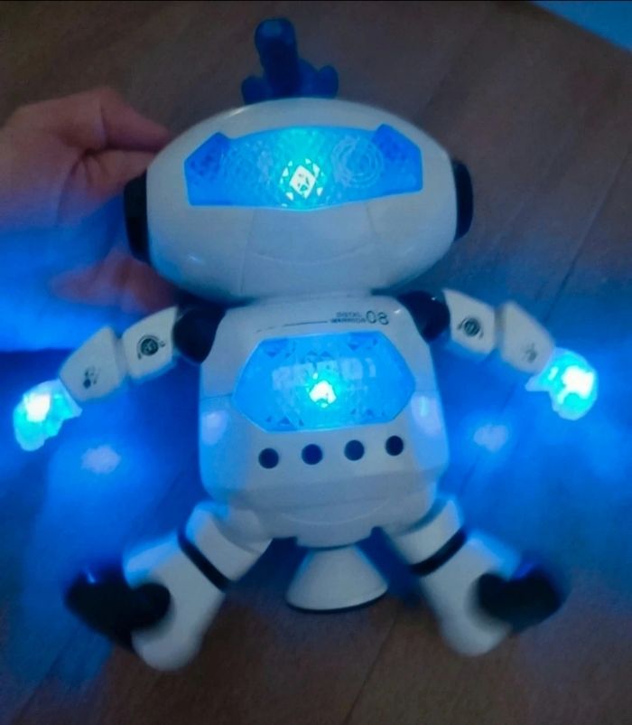 Robot électronique - avec lumière, une chanson et bouge - photo numéro 4