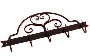 Ancien support mural à Cochonnaille  Fer forgé à décor motifs de volutes