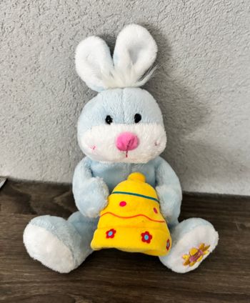 lapin bleu avec cloche jaune 