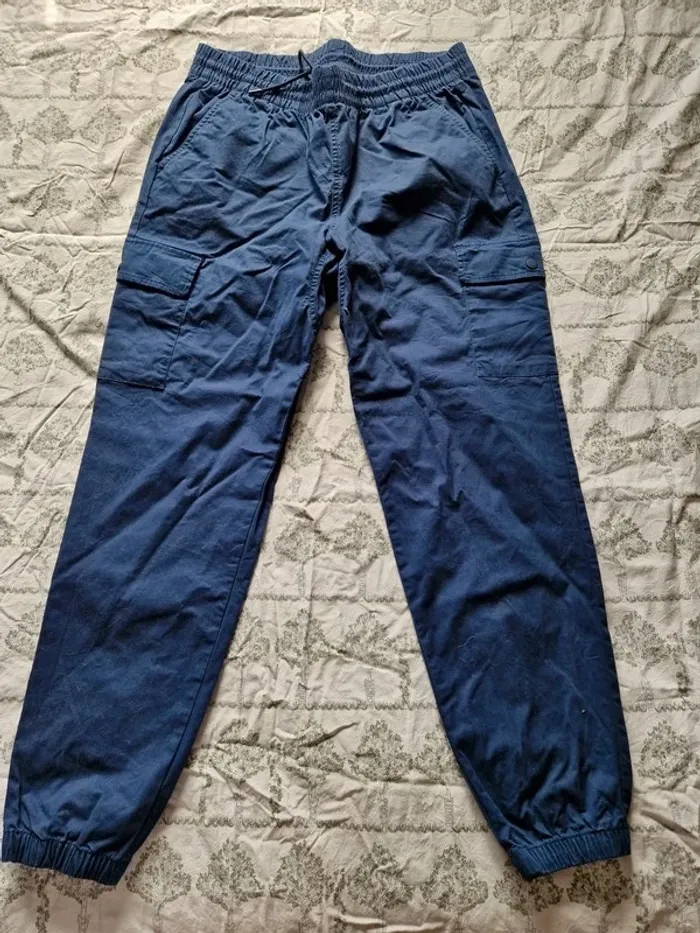 pantalon cargo new balance taille L