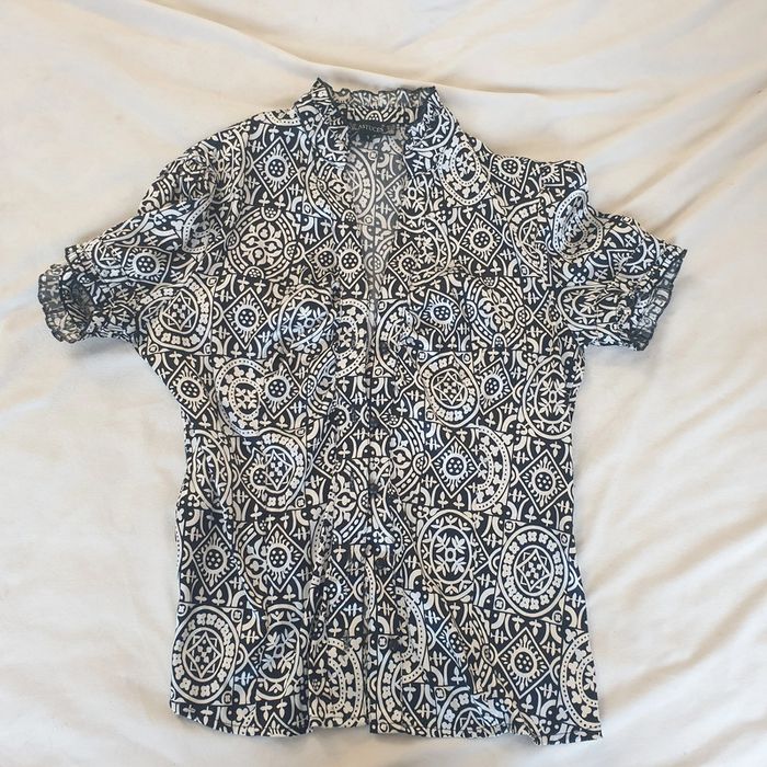 1 chemisette femme manche courte noir et blanche à motif géométrique, marque Astuces taille 1