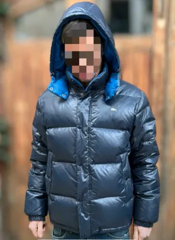 Doudoune Lacoste taille M en duvet et plumes
