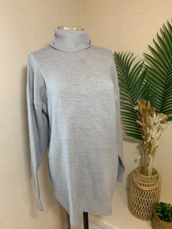 Pull long col roulé femme