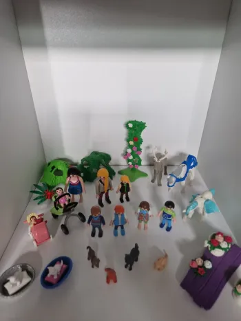 Grand lot de playmobils avec personnages et animaux