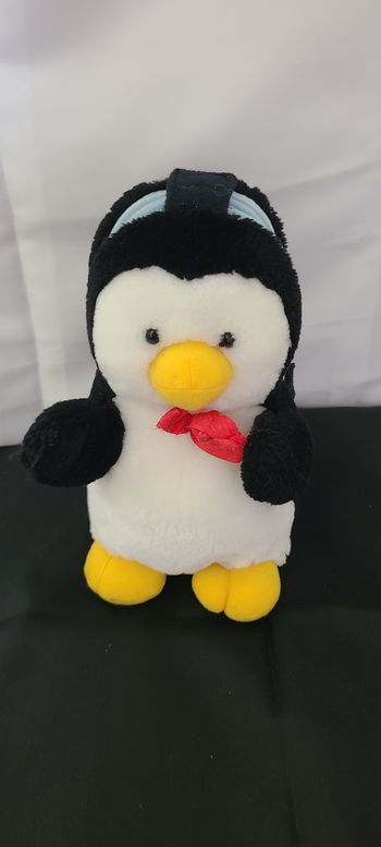 Livre peluche pingouin années 80