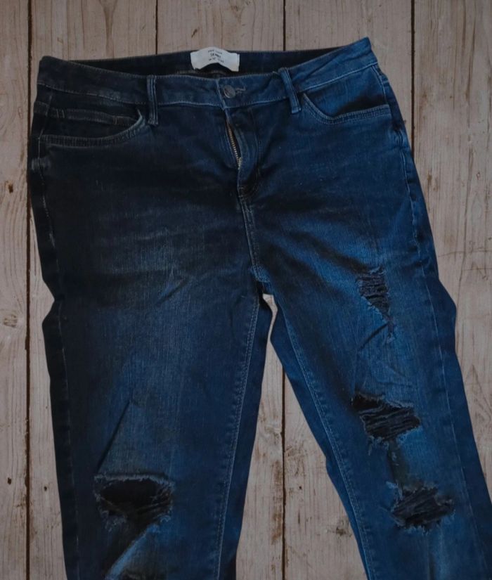 Jeans à trou - photo numéro 3