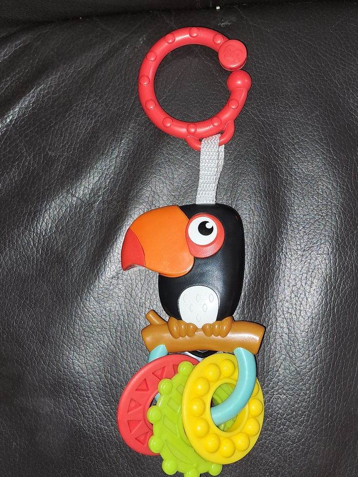 Jouet éveil bébé toucan