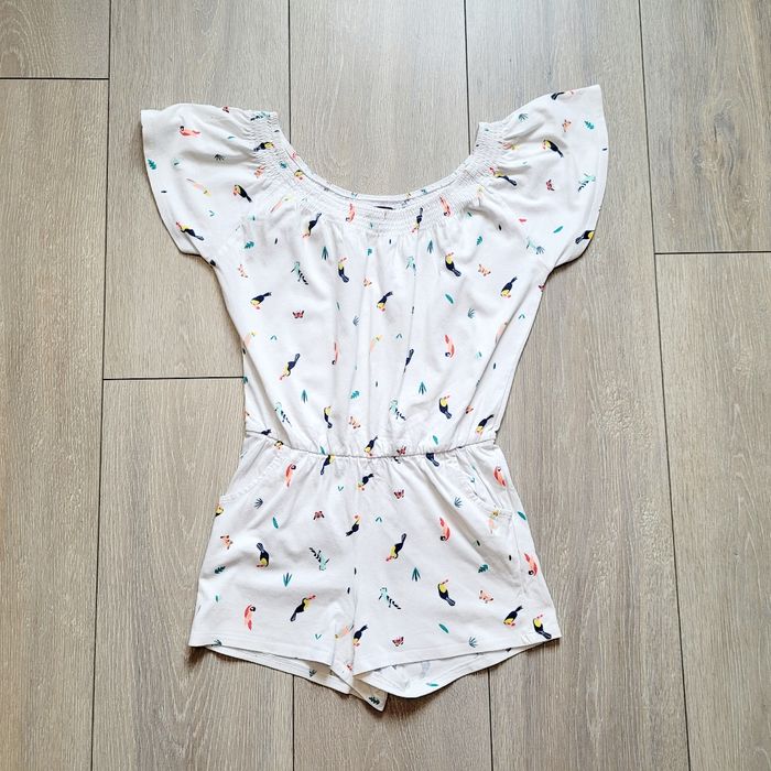 Combinaison short blanc, à motif perroquet. Fille 8 ans. Marque Kiabi