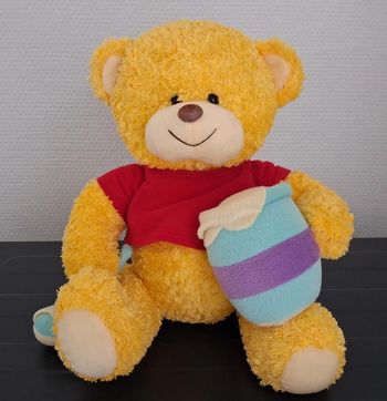 Ourson avec pot de miel