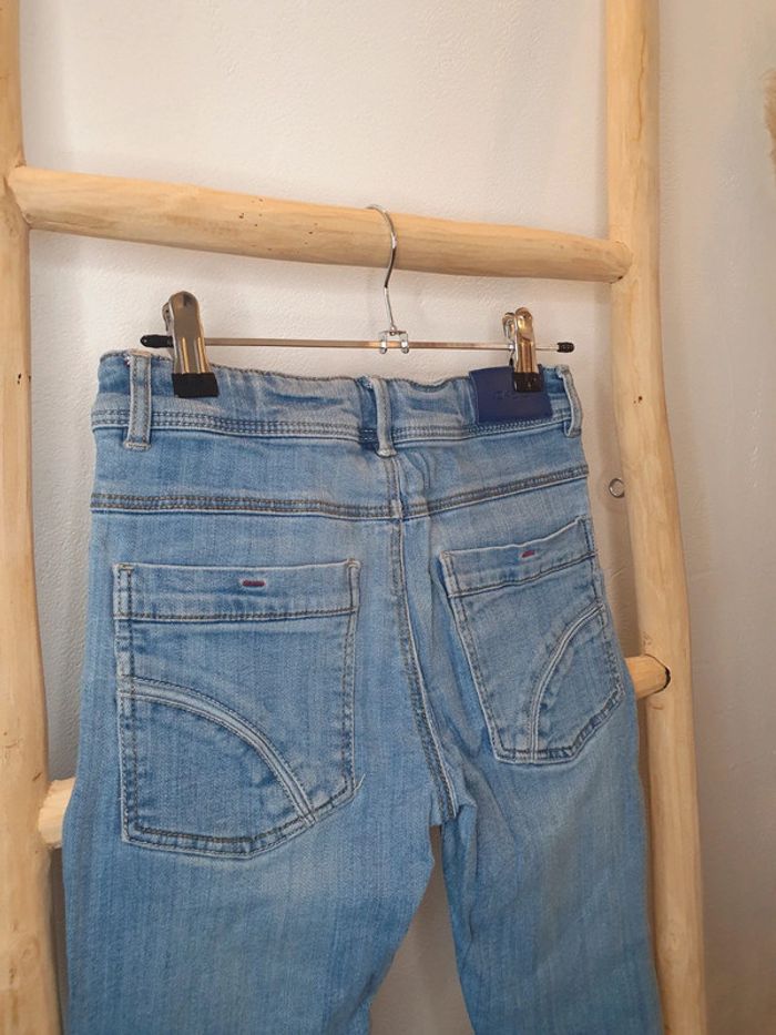 Jean okaidi 10 ans - photo numéro 2