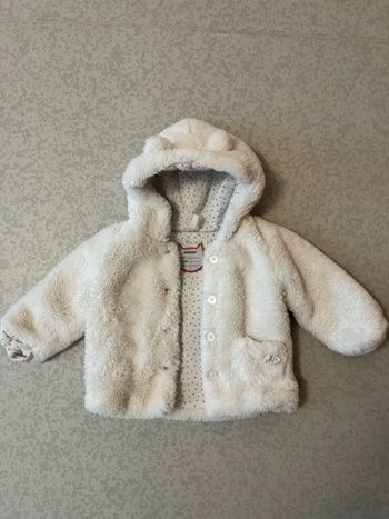 Manteau fausse fourrure