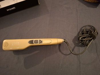 Lisseur vapeur Proxelli Steam Styler – bon état avec boîte