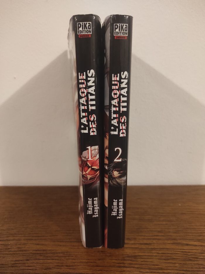 Lot de 2 mangas de l'Attaque des Titans - photo numéro 2