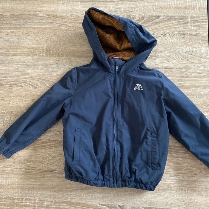 Imperméable avec sac intégré