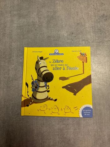 Livre Mamie poule, raconte le zèbre qui ne voulait pas aller à l’école