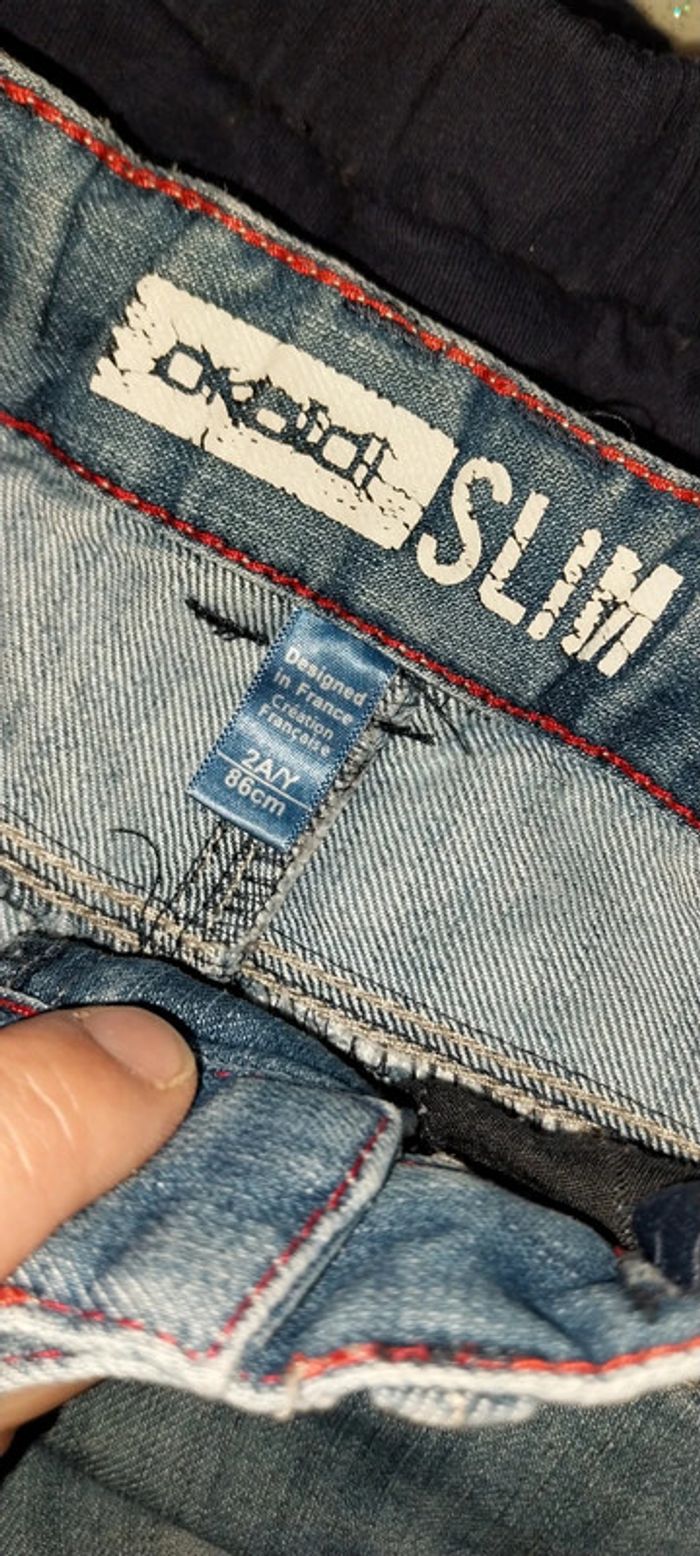 Jean slim Okaidi bleu used effect 2 ans Très bon état - photo numéro 2