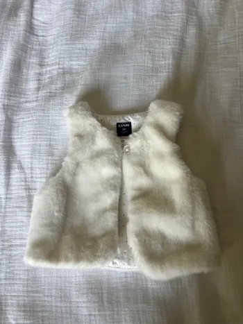 Gilet fausse fourrure 3 mois
